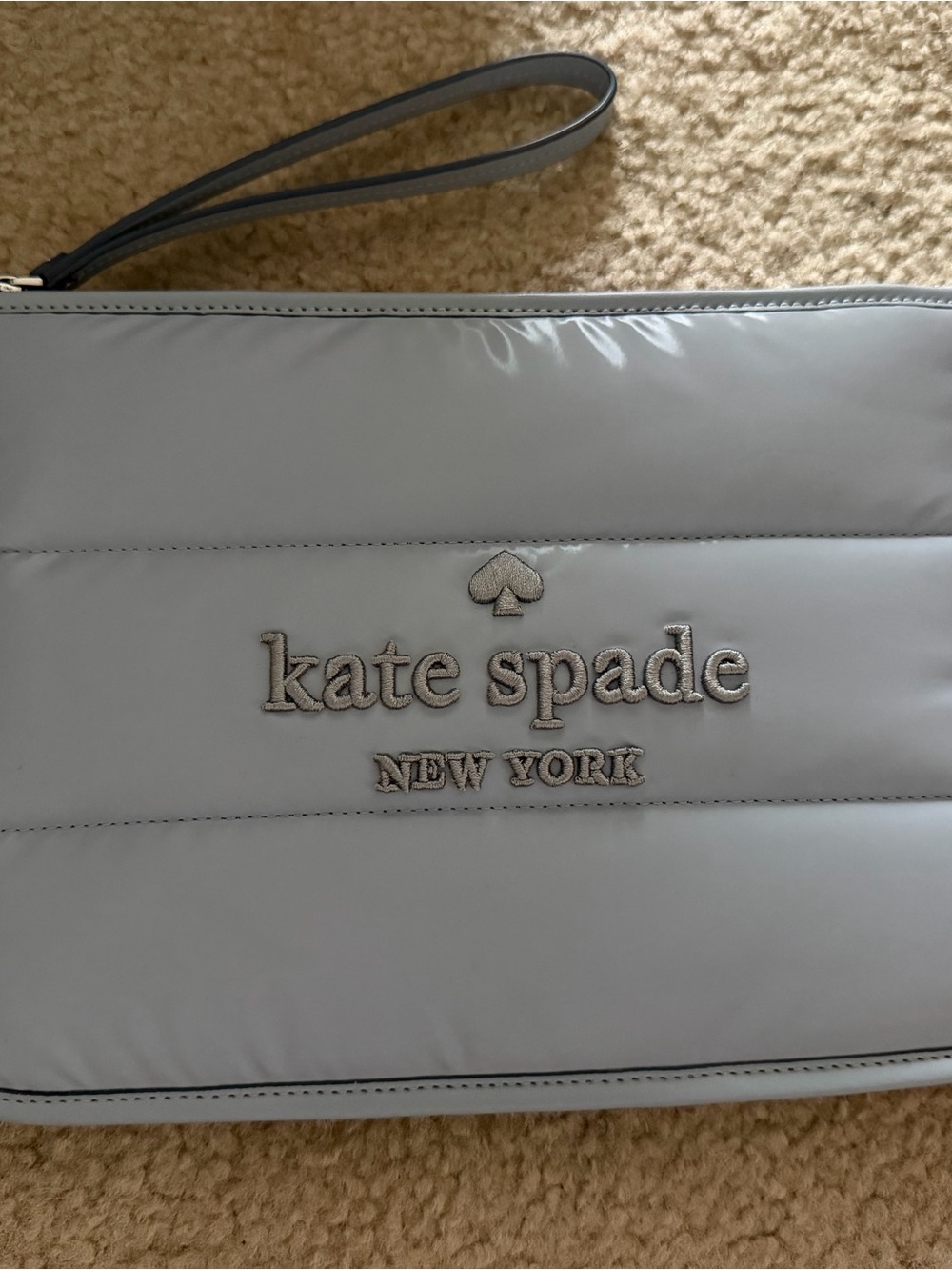 kate spade New York light gray quilted wristlet clutch
